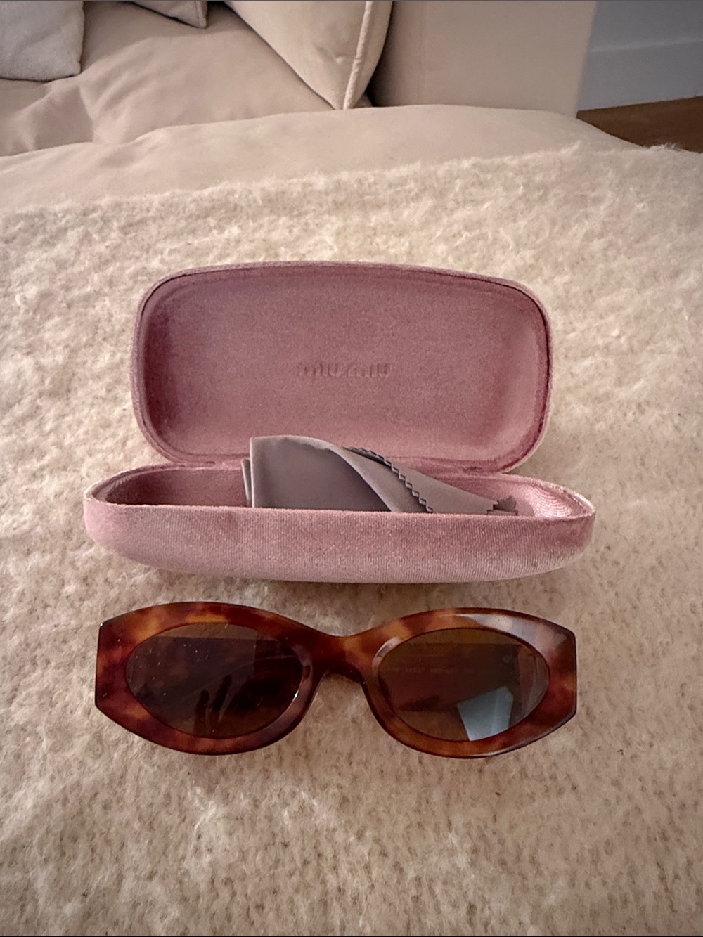 Miu Miu Tortoiseshell Oval Women's Sunglasses - Brown Lenses